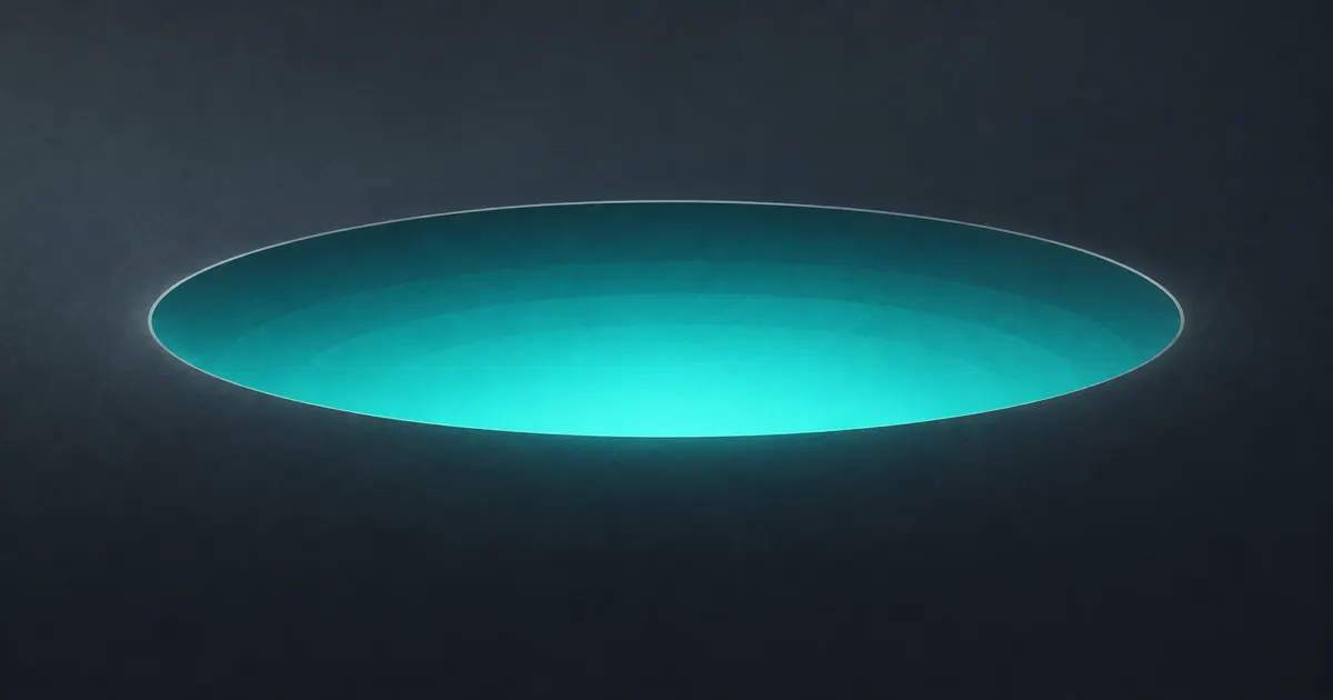 Shallow dip in a graphite surface filling with soft teal light